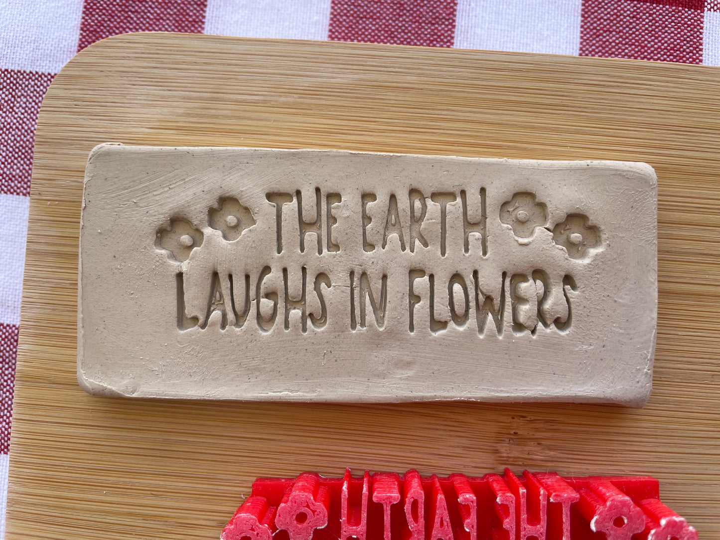"THE EARTH LAUGHS IN FLOWERS" Pottery Word Stamp - Earth themed March 2025 Mystery Box, multiple sizes available