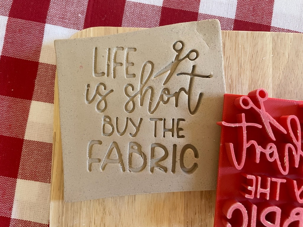 "Life is short buy the Fabric" word stamp, from the June 2024 Fiber Arts themed mystery box - multiple sizes available, 3D printed