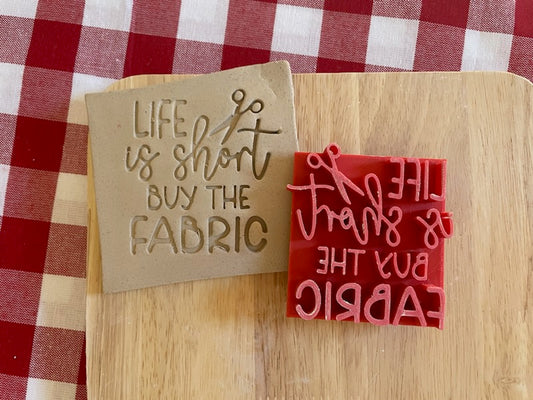 "Life is short buy the Fabric"  word stamp, from the June 2024 Fiber Arts themed mystery box - multiple sizes available, 3D printed