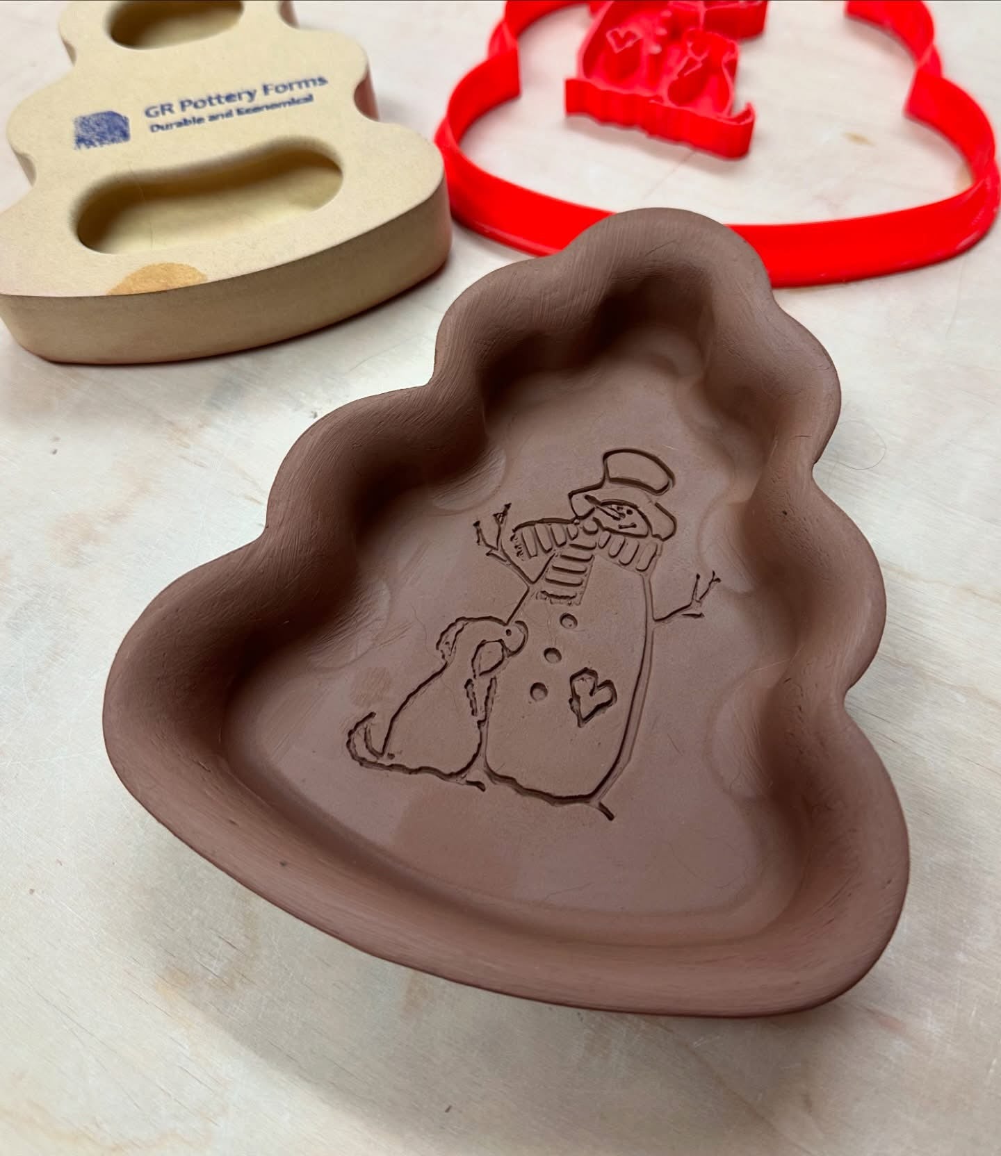 Snowman with Dog design pottery stamp - multiple sizes available