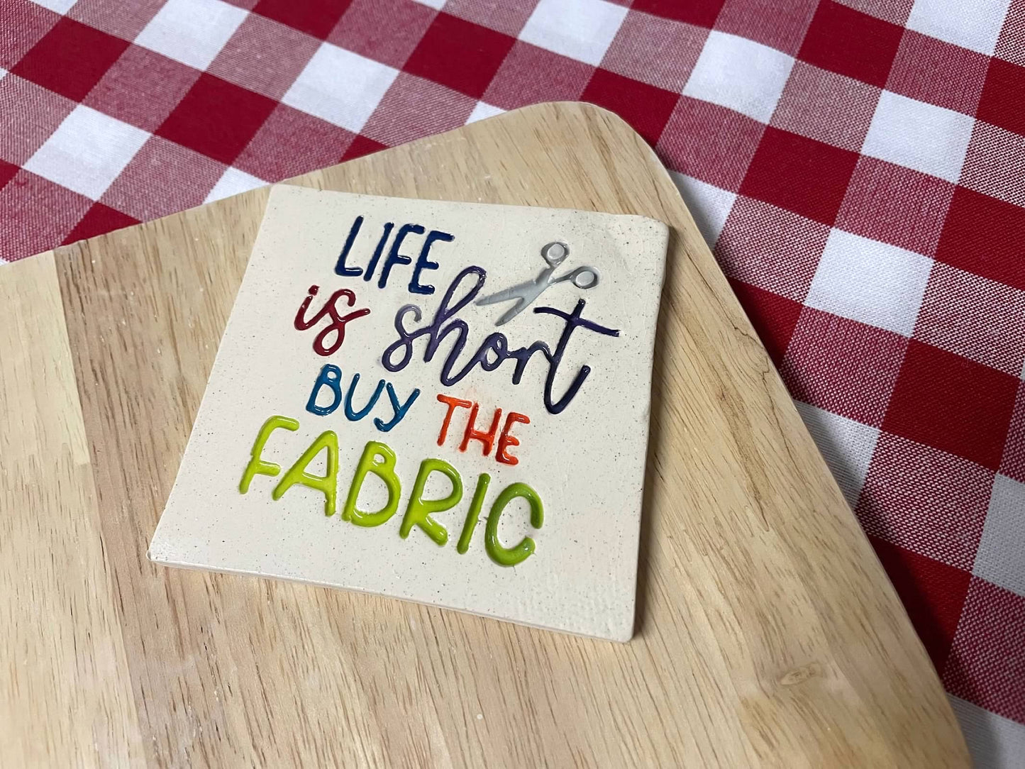 "Life is short buy the Fabric"  word stamp, from the June 2024 Fiber Arts themed mystery box - multiple sizes available, 3D printed