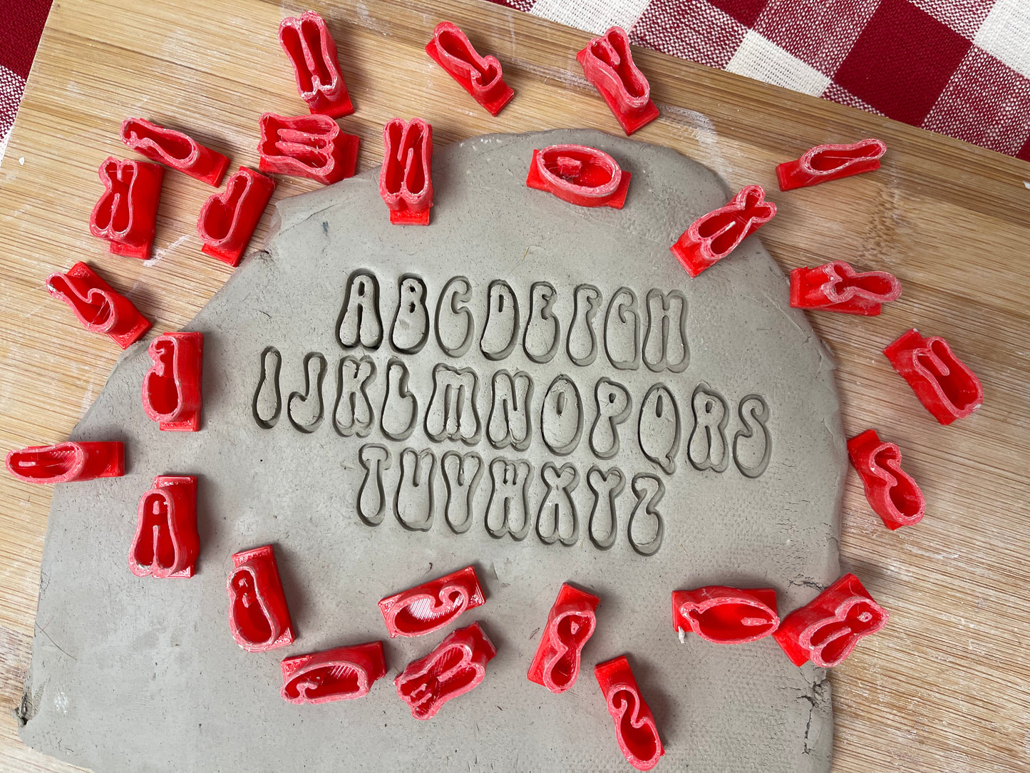 Alphabet Pottery Stamp Set - Groovy Font from the May 2023 mystery